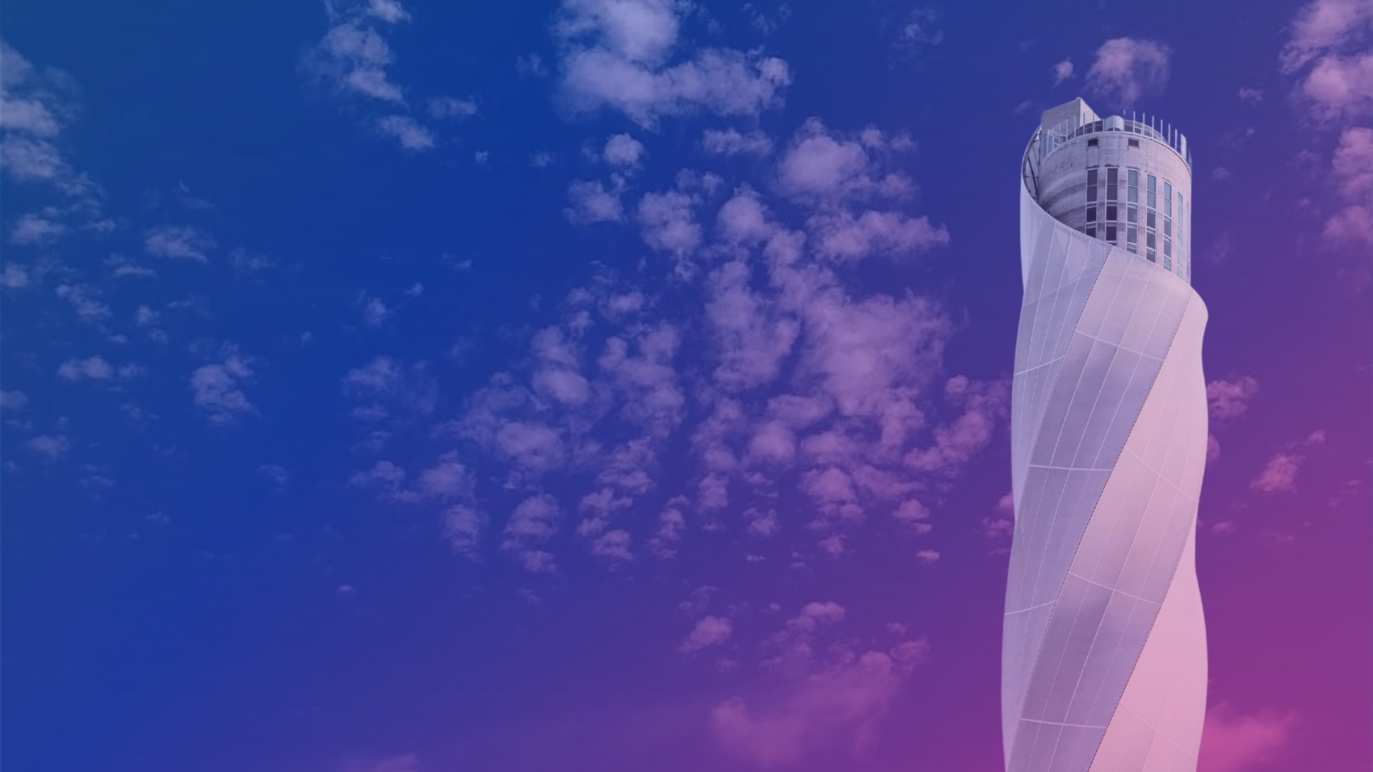 Twisting tower against colorful sky