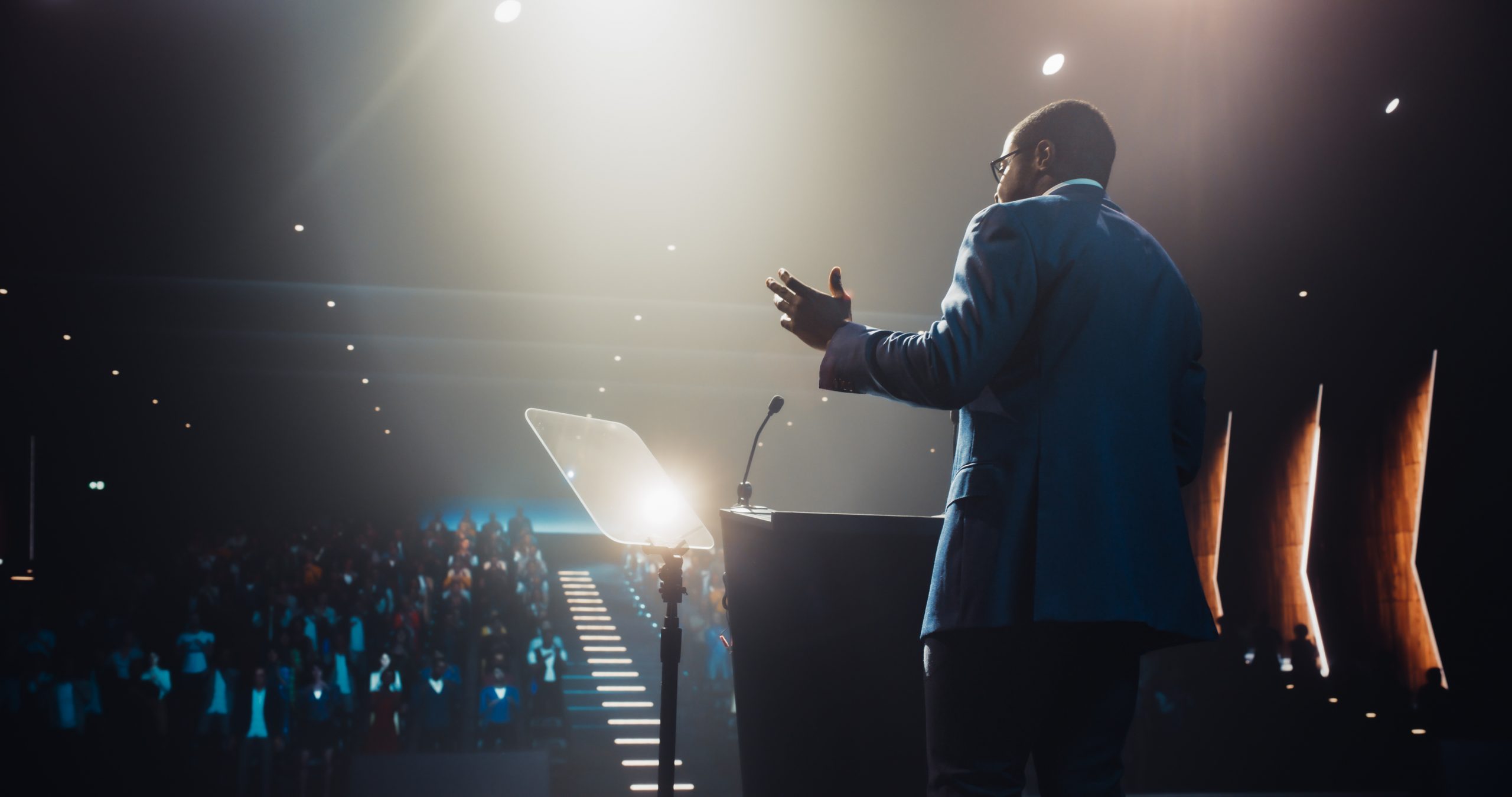 Speaker addressing an engaged audience.